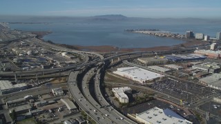 DFKSF08_001 - 5K aerial stock footage of the MacArthur Maze freeway interchange, Oakland, California