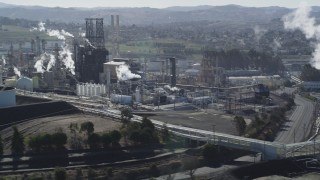 DFKSF08_028 - 5K aerial stock footage of passing by the ConocoPhillips Oil Refinery, Rodeo, California