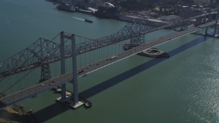 DFKSF08_034 - 5K aerial stock footage of tilting from a docked ship at California Maritime Academy to reveal Carquinez Bridge, California