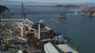DFKSF08_040 - 5K stock footage aerial video of flying by C&H Pure Can Sugar Factory to Carquinez Bridge, Crockett, California