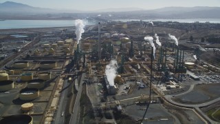 DFKSF08_047 - 5K aerial stock footage of flying by the Valero Oil Refinery, Benicia, California
