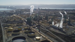 DFKSF08_048 - 5K aerial stock footage of passing by the Valero Oil Refinery, Benicia, California