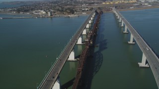 DFKSF08_056 - 5K aerial stock footage of flying by the Benicia-Martinez Bridge, Carquinez Strait, California