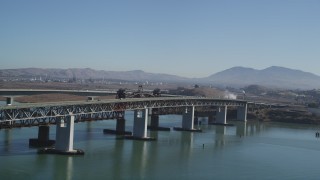 DFKSF08_057 - 5K aerial stock footage of a reverse view of the Benicia-Martinez Bridge, California
