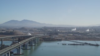 DFKSF08_058 - 5K aerial stock footage pan from the Benicia-Martinez Bridge to the Shell Oil Refinery, California
