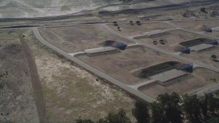 DFKSF08_069 - 5K aerial stock footage of flying away from the Port Chicago weapons depot, Bay Point, California