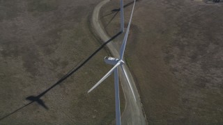 DFKSF08_075 - 5K aerial stock footage flyby and away from a windmill at Shiloh Wind Power Plant, Montezuma Hills, California