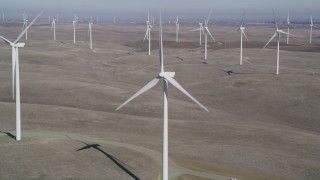 DFKSF08_078 - 5K aerial stock footage of flying close to a windmill at Shiloh Wind Power Plant, Montezuma Hills, California