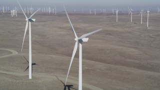 DFKSF08_079 - 5K aerial stock footage of flying by windmills at Shiloh Wind Power Plant, Montezuma Hills, California