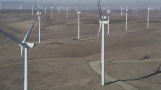 DFKSF08_081 - 5K aerial stock footage of flying by windmills at Shiloh Wind Power Plant, Montezuma Hills, California