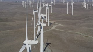 DFKSF08_084 - 5K stock footage aerial video of passing a field of windmills, Shiloh Wind Power Plant, Montezuma Hills, California