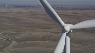 DFKSF08_085 - 5K stock footage aerial video fly near top of windmill, Shiloh Wind Power Plant, Montezuma Hills, California