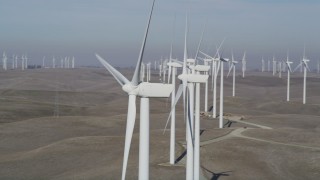 DFKSF08_092 - 5K aerial stock footage of flying by windmills at the Shiloh Wind Power Plant, Montezuma Hills, California