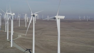 DFKSF08_093 - 5K stock footage aerial video of flying by windmills at Shiloh Wind Power Plant, Montezuma Hills, California