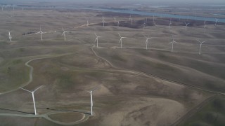 DFKSF08_096 - 5K aerial stock footage of flying by field of windmills, Shiloh Wind Power Plant, Montezuma Hills, California