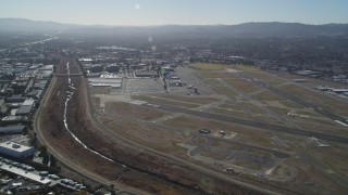 DFKSF08_112 - 5K aerial stock footage of approaching Buchanan Field Airport, Concord, California