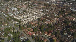 DFKSF09_001 - 5K aerial stock footage of a reverse view of tract homes in a suburban neighborhoods, Pleasant Hill, California