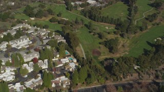 DFKSF09_003 - 5K aerial stock footage of a reverse view of Contra Costa Golf Club, reveal apartment buildings Pleasant Hill, California