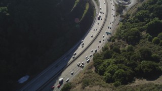 DFKSF09_008 - 5K aerial stock footage pan across Highway 24 freeway with heavy traffic, Orinda, California