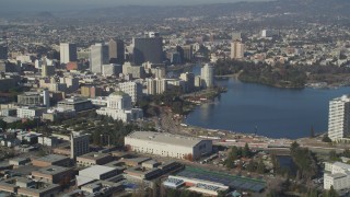 DFKSF09_059 - 5K stock footage aerial video flyby Downtown Oakland and Lake Merritt, California
