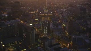DFKSF10_078 - 5K aerial stock footage of approaching San Francisco City Hall in Civic Center, San Francisco, California, twilight