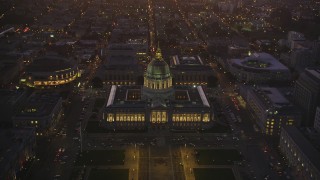 DFKSF10_079 - 5K aerial stock footage of an approach to San Francisco City Hall in Civic Center, San Francisco, California, twilight