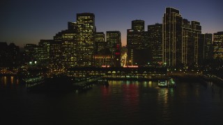DFKSF10_093 - 5K aerial stock footage of the Ferry Building and skyline of Downtown San Francisco, California, night