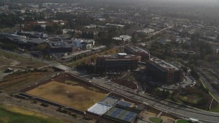 DFKSF11_013 - 5K stock footage aerial video of flying by Googleplex, Mountain View, California