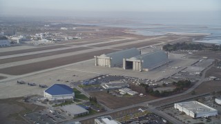 DFKSF11_024 - 5K aerial stock footage of Hangars 2 and 3 at Moffett Field, Mountain View, California