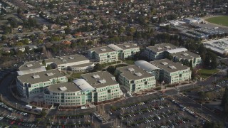DFKSF12_014 - 5K aerial stock footage of an orbit of Apple Headquarters office buildings, Cupertino, California