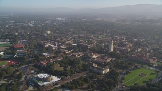 DFKSF12_020 - 5K aerial stock footage of flying by Stanford University campus in Stanford, California