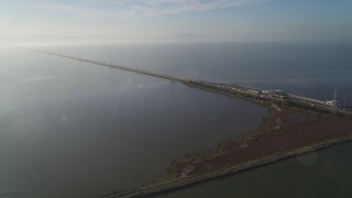 DFKSF12_038 - 5K aerial stock footage of the San Mateo Bridge, Hayward, California