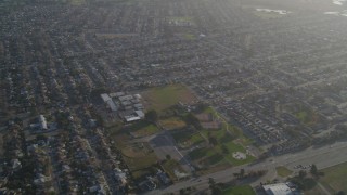 DFKSF12_040 - 5K aerial stock footage of a reverse view of suburban homes, San Lorenzo, California