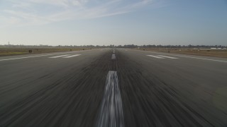 DFKSF12_043 - 5K aerial stock footage of approaching runway for landing at Oakland International Airport, California