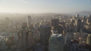 DFKSF13_020 - 5K aerial stock footage pan from downtown skyscrapers to Civic Center, Downtown San Francisco, California