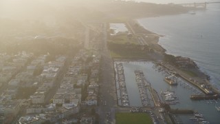 DFKSF13_034 - 5K aerial stock footage of flying over Marina District, tilt to apartment buildings, San Francisco, California