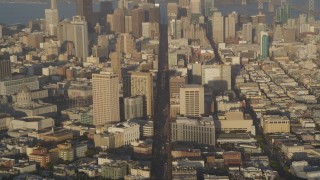 DFKSF13_051 - 5K aerial stock footage of flying over Market Street, tilt to reveal skyscrapers in Downtown San Francisco, California