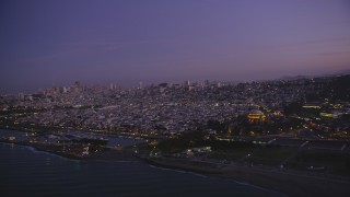 DFKSF14_054 - 5K aerial stock footage of panning from Marina District to Downtown San Francisco skyline, California, twilight