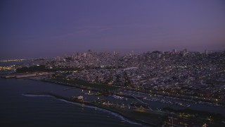 DFKSF14_055 - 5K aerial stock footage of a view of the city skyline of Downtown San Francisco, California, twilight