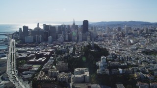 DFKSF15_017 - 5K aerial stock footage of the Transamerica Pyramid, skyscrapers and Coit Tower, Downtown San Francisco, California