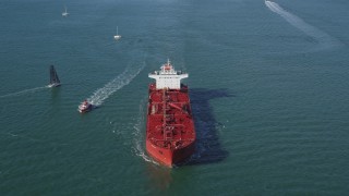 DFKSF15_020 - 5K aerial stock footage of flying over oil tanker sailing San Francisco Bay, San Francisco, California