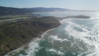 DFKSF15_067 - 5K aerial stock footage pan from Half Moon Bay Airport to Pillar Point Air Force Station, Half Moon Bay, California