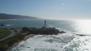 DFKSF15_096 - 5K aerial stock footage approach Pigeon Point Light Station in Pescadero, California