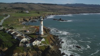 DFKSF15_097 - 5K aerial stock footage of Pigeon Point Light Station overlooking the ocean in Pescadero, California