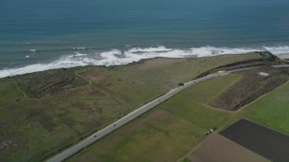 DFKSF15_111 - 5K aerial stock footage of the Highway 1 coastal road in Davenport, California