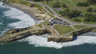 DFKSF15_128 - 5K aerial stock footage of orbiting the Santa Cruz Surfing Museum in Santa Cruz, California