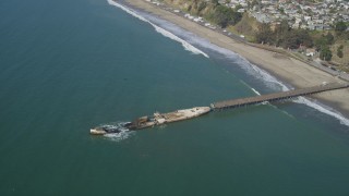 DFKSF15_142 - 5K aerial stock footage of orbiting the SS Palo Alto shipwreck near Seacliff State Beach, Aptos, California