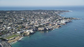 DFKSF16_005 - 5K aerial stock footage approach coastal residential neighborhoods and Monterey Bay Aquarium, Monterey, California