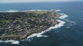 DFKSF16_010 - 5K aerial stock footage tilt to reveal kelp forests and coastal residential neighborhoods, Monterey, California