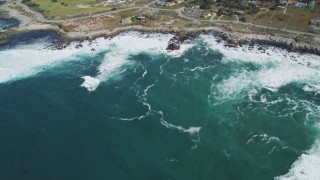DFKSF16_013 - 5K aerial stock footage tilt from the ocean, reveal Point Pinos Lighthouse Reservation, Monterey, California